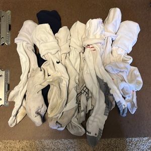 9 pairs of used soccer socks